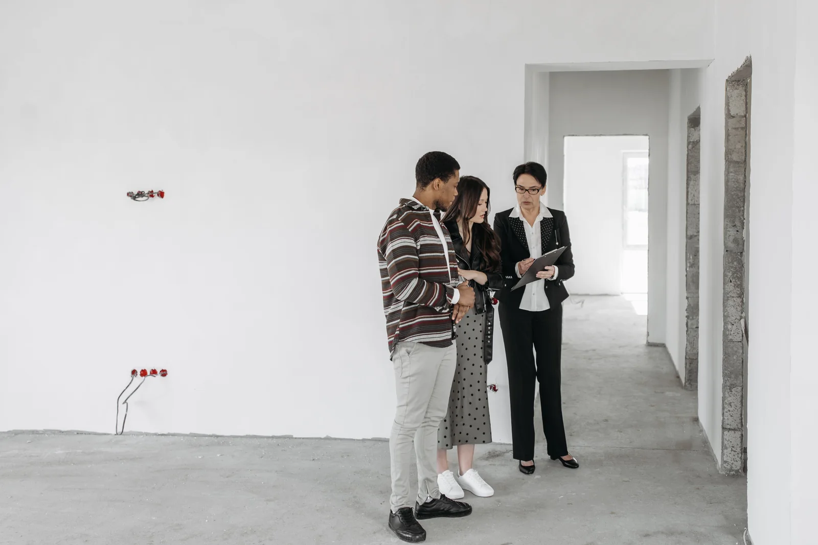 Investors reviewing a rental property